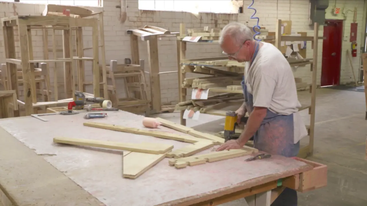 Employee building a frame